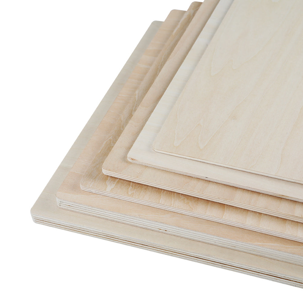 A stack of rectangular wooden boards of various sizes is neatly arranged, with the largest board at the bottom and the smallest on top. The edges appear smooth, and the light natural finish highlights that these are high-quality Falcon Series Basswood Plywood Sheets by CrealityFalcon, ideal for DIY home decoration or laser engraver materials.