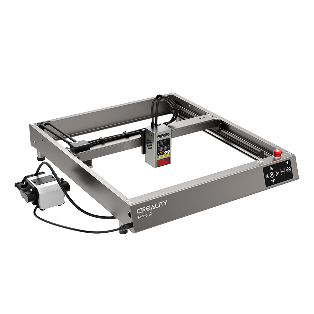 A Falcon2 12W Laser Engraver and Cutter with a square frame. The machine, also versatile as a laser engraver, features a control panel with buttons on one side and connected wiring, including a power supply unit. The metal chassis is labeled "CrealityFalcon.