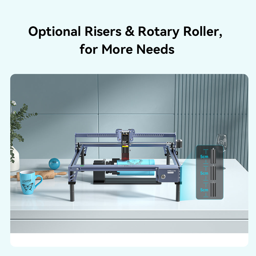 A blue and silver CrealityFalcon CR-Laser Falcon 10W Laser Engraver is shown engraving an image of an eagle with outstretched wings onto a wooden surface, demonstrating its high precision engraving capabilities. The text "10W Creality Falcon" is visible on the wood, next to the engraved eagle.