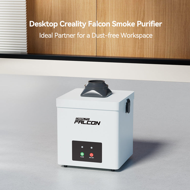 A CrealityFalcon Falcon Desktop Smoke Purifier for Falcon A1 sits on a tabletop in a modern room, with text above calling it the ideal partner for maintaining a dust-free workspace.