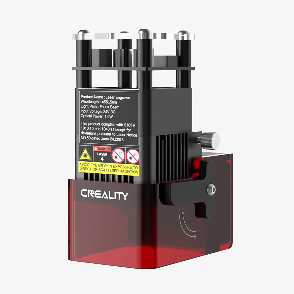 A red and black CrealityFalcon Laser Module, compatible with Ender-3 and other suitable Creality3D printers, featuring a detailed product label on the rear side. The laser module includes specifications such as wavelength and optical power, has multiple vents at the top, and a clamp mechanism on the side. Available in 1.6W/5W/10W power options.