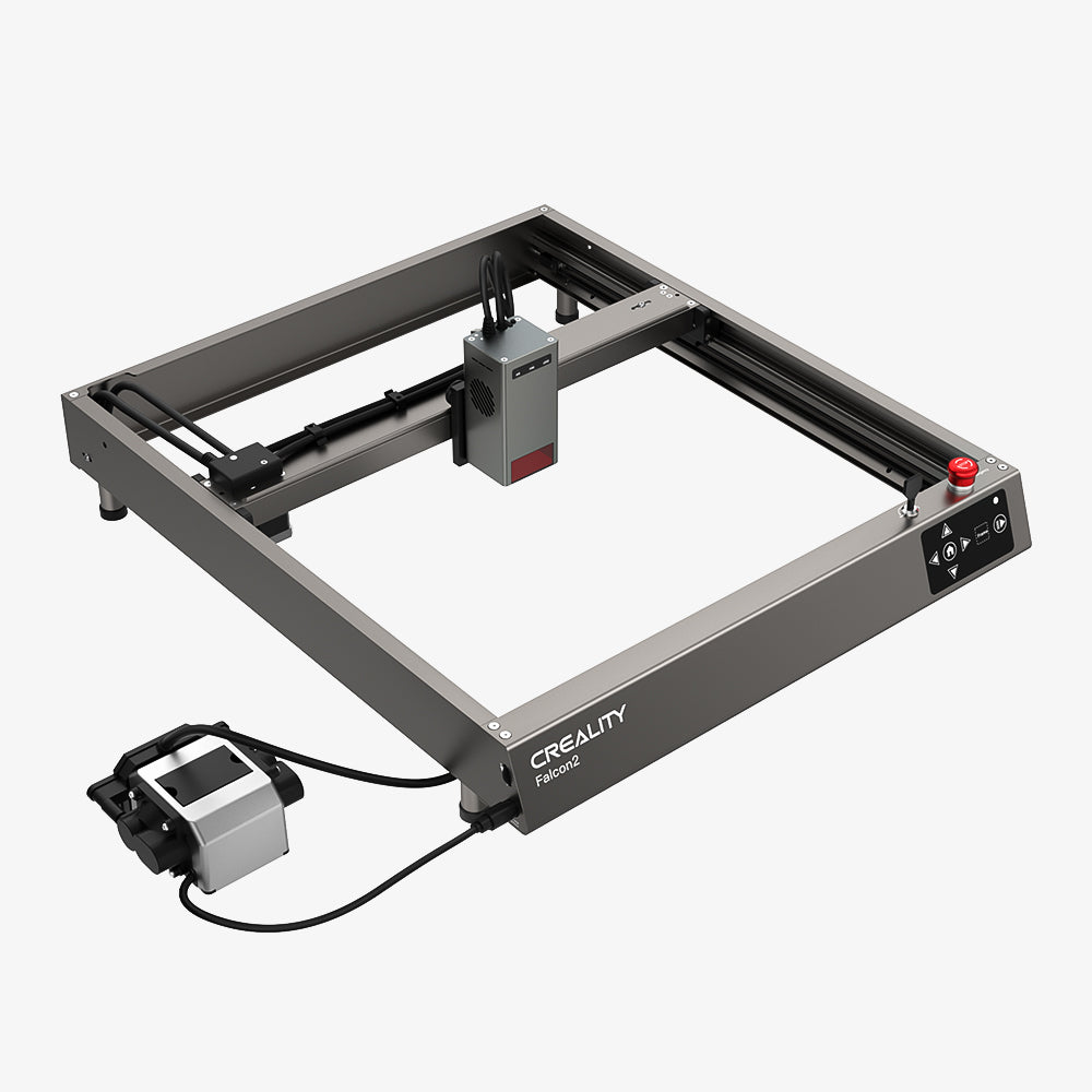 The CrealityFalcon Falcon2 22W Laser Engraver and Cutter features a sleek, open-frame design with a gray metallic structure. It comes equipped with an automated laser module and a small control panel on one side. For enhanced precision, it includes an integrated air assist, and the connected power supply unit is conveniently positioned beside the machine.