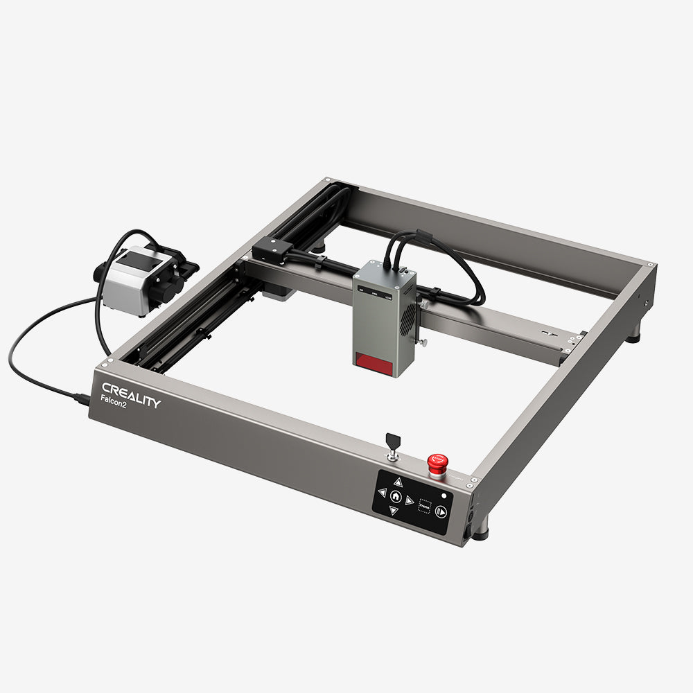 The CrealityFalcon Falcon2 40W Laser Engraver and Cutter, featuring a rectangular frame with a central laser module, delivers ultra-fast cutting speeds. It includes a control box attached to the left side, a red emergency stop button on the front right corner, and is set against a plain white background.