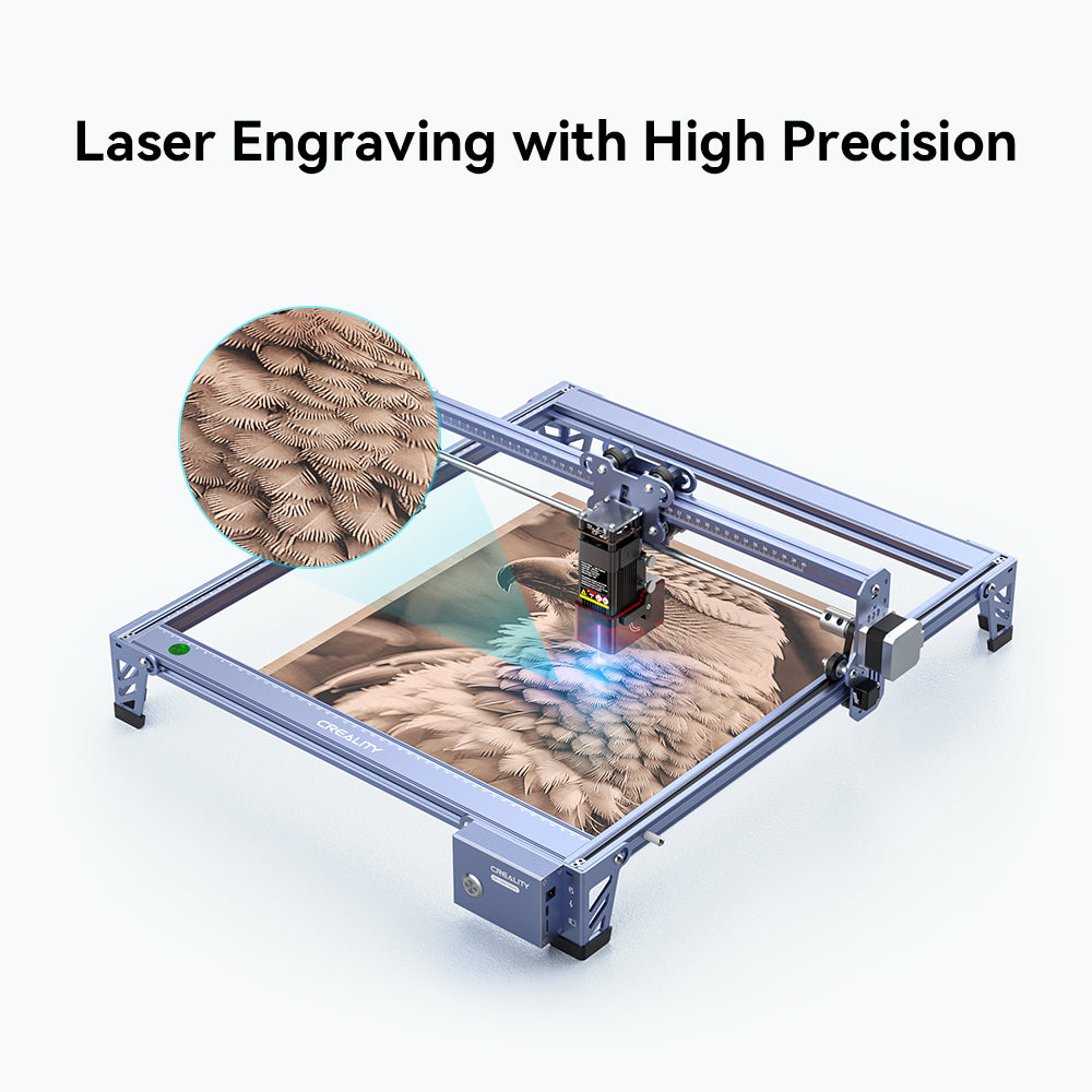 The CR-Laser Falcon 5W Laser Engraver by CrealityFalcon, renowned for its ultra-fine engraving accuracy, etches a detailed image of an eagle with "5W FALCON" text onto a wooden board. The machine features a robust blue metal frame and a control module positioned above the larger engraving area.